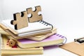 Jigsaw puzzle piece on the stack of books, image use for solving problems, education background concept