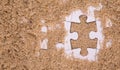 Jigsaw Puzzle Pieces Buried In Sand I