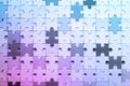 Jigsaw puzzle pieces colored with liquid pink blue color gradient