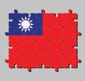 Jigsaw puzzle of Taiwan flag in a red field with a blue canton containing a 12-ray white sun. Royalty Free Stock Photo