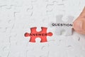 Jigsaw puzzle with the text QUESTION and ANSWER. Conceptual image Royalty Free Stock Photo