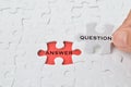 Jigsaw puzzle with the text QUESTION and ANSWER. Conceptual image