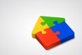 Jigsaw puzzles are combined together and have shape of whole house