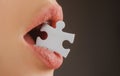 Jigsaw solution. Life problems. Female mouth with puzzle piece.