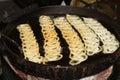 Jilapi making on a hot big pan.Jalebi, also known as jilapi, jilebi, jilipi, zulbia, jerry, mushabak, or zalabia, is a popular