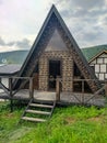 Jily-Su, Caucasus, Russia - August 18, 2022: View of the wooden houses for the rest of tourists in the Caucasus mountains.