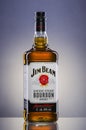 Jim Beam bourbon whiskey on gradient background.