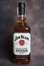 Jim Beam whiskey bottle on dark vintage background