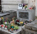 Jim Morrison grave in Pere-Lachaise cemetery in Paris, France. Fans and visitors come to pay homage to Jim Morrison`s the