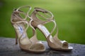 Jimmy Choo ivory shoes in a garden previous to bride wearing them for her wedding