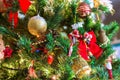 Jingle bell, Christmas tree branches with blurred background. Royalty Free Stock Photo