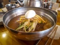 Jinju Naengmyeon, Korean noodle dish of handmade noodles made from buckwheat and cold broth made from beef.