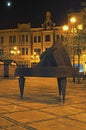 Jirasek square Jiraskovo namesti at summer night. Modern art sculpture of one piano