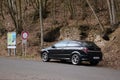 Jirkov, Czech republic - April 04, 2019: black car Opel Astra H stand near Jirkov dam