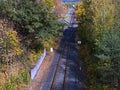 Jirkov, Czech republic - October 22, 2019: empty train track leading from Chomutov city to Jirkov city in autumn