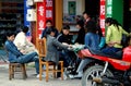 Jiu Chi Town, China: Shopkeepers Playing Mahjong Royalty Free Stock Photo