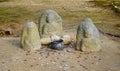 Jizo statues with coin offerings in Kinkaku-Ji temple, Kyoto, Japan Royalty Free Stock Photo