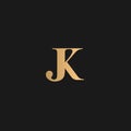 JK logo Golden Yellow on black background