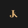 JK logo Golden Yellow on black background