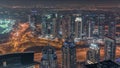 JLT and Dubai marina skyscrapers near Sheikh Zayed Road aerial night timelapse. Residential buildings Royalty Free Stock Photo