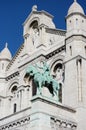 Joan of Arc bronze equestrian statue on the facade of the Sacre Coeur Royalty Free Stock Photo