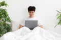 Job in bedroom, social networks, surfing, browsing on internet, modem device Royalty Free Stock Photo