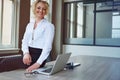 Job fulfillment at its best. Portrait of a businesswoman working at her desk in an office. Royalty Free Stock Photo