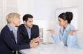 Job interview or business meeting: man and woman sitting at the Royalty Free Stock Photo