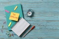 Job interview concept. Composition of notebooks, pens, pencil, stickers on a colored background. Royalty Free Stock Photo