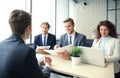Job interview with the employer, businessman listen to candidate answers. Royalty Free Stock Photo