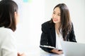 Beautiful young asian businesswoman talking applicant people Royalty Free Stock Photo