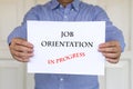 Job orientation in progress, words printed on white paper Royalty Free Stock Photo