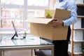 Job Quit. Employee Holding Cardboard Box