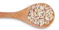 Job`s tears or Coix Lachrymal adlay in wooden spoon is a very nutritious cereal. The seeds are rich in minerals, vitamins, dietary