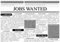 Job search. Newspaper full of advertisements