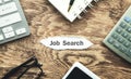 Job Search text on piece of torn paper