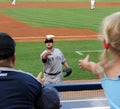 Joba Chamberlain tosses ball to fan Royalty Free Stock Photo