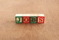 Jobs or Employment Concept Highlighted with Letter Wooden Blocks