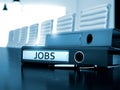 Jobs on Ring Binder. Blurred Image. Royalty Free Stock Photo