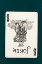 Jocker play card on a green background Royalty Free Stock Photo