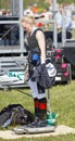 Jockey Malin Holmberg weighing before the gallop horse race to adjust the extra weight in her vest