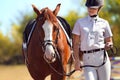 Jockey with purebred horse Royalty Free Stock Photo
