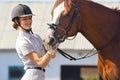 Jockey with purebred horse Royalty Free Stock Photo