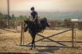Jockey riding a thoroughbred horse Royalty Free Stock Photo