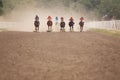 Jockeys during horse races on his horses