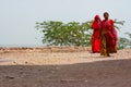 Jodhpur, India - August 20, 2009: two women walk in traditional dress near the fort of Jodhpur, India Royalty Free Stock Photo