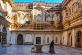 Jodhpur, India - Jan 02, 2020: Unidentified woman cleans the floor at Mehrangarh Fort in Jodhpur, Rajasthan, India Royalty Free Stock Photo