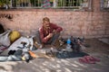 Shoe maker and repair in the streets of Jodhpur city in India