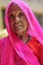 Jodhpur, India, september 10, 2010: Old indian woman face in pink sari.