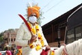 Jodhpur, Rajashtbn, India. 30 June 2020: Indian groom wearing mask sitting on horse, people getting married after ease in lock